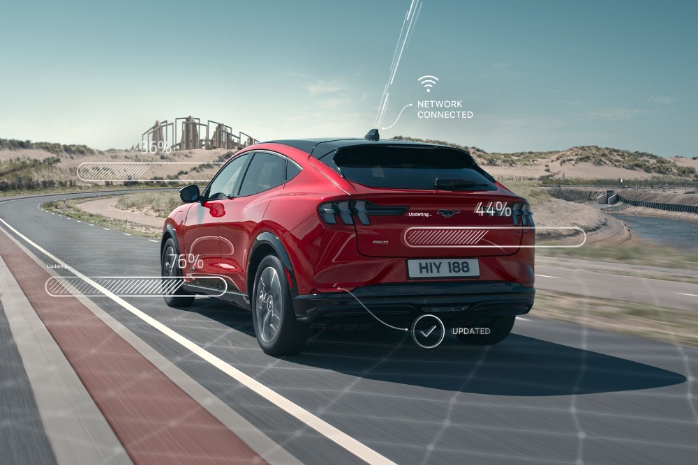 Mustang Mach-E driving on a race track in the mountains