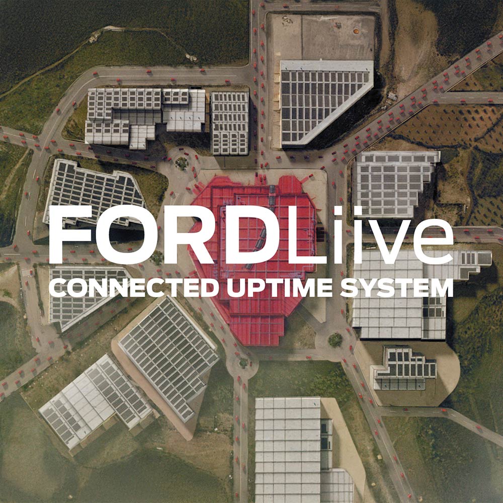 Egy épületkomplexum légi felvétele a FORDLiive logóval.